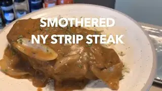 How to make Smothered Ny Strip Steak  over a fluffy bed of rice