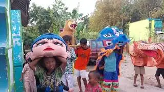 Burok putra kuningan kostum arak arak