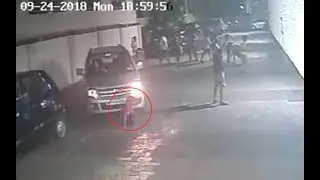 Boy run over by car, stands up, walks away and start playing