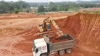 HITACHI Excavator Loading Dump Trucks Transport Soil - Sotiriadis Mining Works