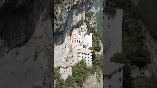 The astonishing church right on the edge of a mountain in Italy 🇮🇹 #shorts #travel #italy