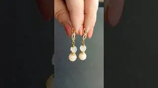 Rose carved carnelian earrings in rare opalescent milky white colour