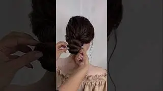 Низкий пучок на длинные густые волосы