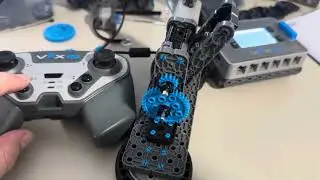 How to program a controller buttons for adjusting the robot’s arm to the desired position VEX IQ
