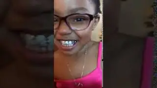 Black Mike daughter wearing his grill