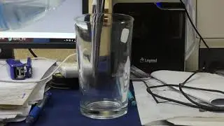Water Falling From Bottle in to Glass