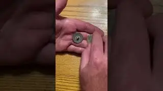 What is a Tombac button? Explained.￼ 