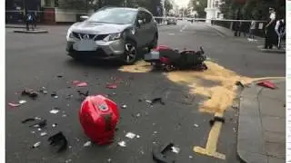 Kensington crash: Motorcyclist fighting