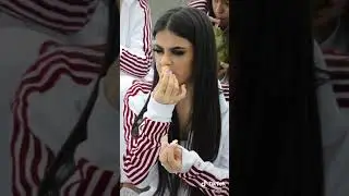 Sabina comendo paçoca pela primeira vez