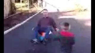 Joel Lane riding scooter
