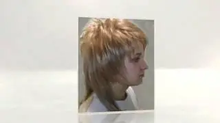 Женская стрижка волчица с косой челкой