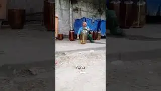 A MAN and an INFLATED BOTTLE...