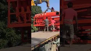 unload the new paddy threshing machine