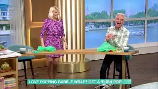Holly Willoughby @shoes off for pillow bubble wrap popping