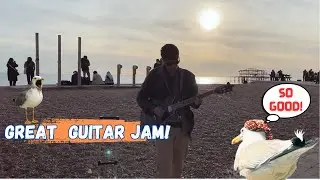 Guitar player Jorge Taboada and his creative style. Busking.