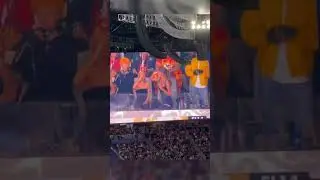 Taylor Swift chugging on the Jumbotron!