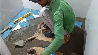 pasting bathroom wall and flooring tiles with design