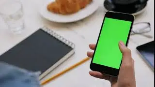 woman using smartphone with green screen close up video of womans