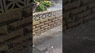 Pressure washing outside wall