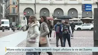 Milano sotto la pioggia: 7mila ombrelli illegali affollano le vie del Duomo