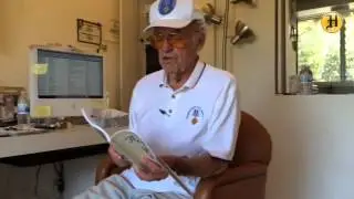 Author Howard Brunn reads a poem about former Herald photographer Ben Lyon from his new book Flaps U