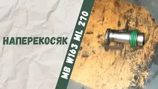 Replacing the left engine mount on a Mercedes-Benz W163 ML270