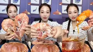 The cute girl eating shrimp for seafood # 171