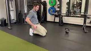 Tall kneeling sit back for pelvic motor control