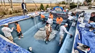 CONSTRUCTION SITE in the USA. 1 working, 5 watching.