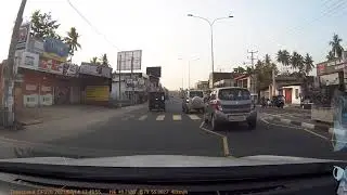 Lady driver swerving all over without using mirrors