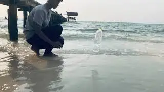 Bottle flip at beach