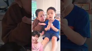 The stingy child in the blue shirt doesn't want to share ice cream 🤪 