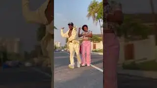 Afronitaaa and Championrolie sharing good vibes on the dance floor