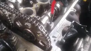 Helicoil cam bolt