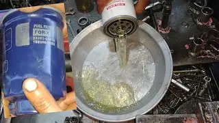 how to diesel engine fuel filter new installed // Toyota 2lt engine fuel filter change