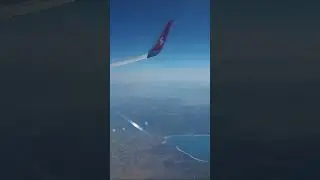 Вид на карьер в Турции из иллюминатора самолёта Airbus A321. Красота с высоты птичьего  полёта.