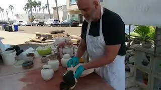 Glazing pottery with a soft bristle brush