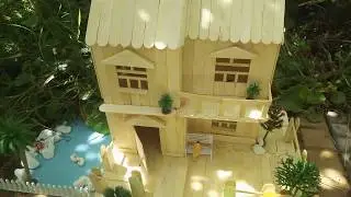 Make houses with ice cream sticks