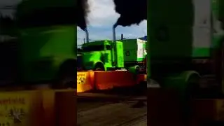 Truck pulling tractor pulling 