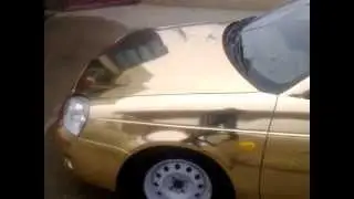 Золотая приора седан по городу