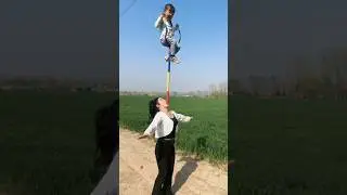 How the girl has lifted the child with the help of wood #amazing #shorts