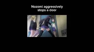 Nozomi Tojo aggressively stops a door (Love Live! School Idol Project)