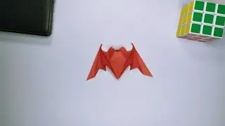Origami Happy Good-Luck Bat, Designed by Michael G. LaFosse. Deki Malik - Black Maple - Acer Nigrum