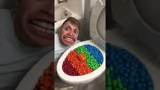 Eating Colorful Chocolate M&M's Candy in Toilet 