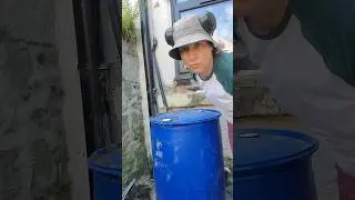 cutting a blue barrel 'lid'