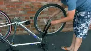 How to remove a bicycle wheel and repair a puncture