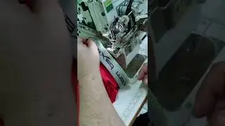 оверлок с электронным податчиком эластичной тесьмы. швейная машинка.