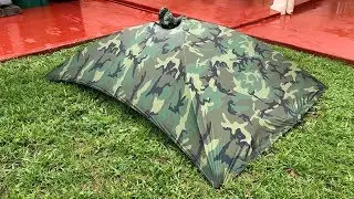 The Alpha Tent Poncho in heavy rain