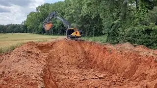 Creating A Rather Large Borrow Pit To Build This Pad