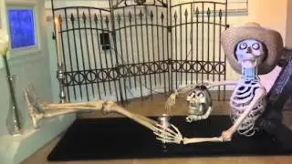 Animatronic Cowboy Skeleton and Tombstone TV